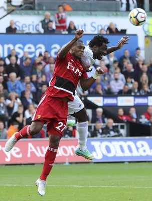 230917 - Swansea City v Watford, Premier League - Wilfried Bony of Swansea City and Christian Kabasele of Watford compete for the ball