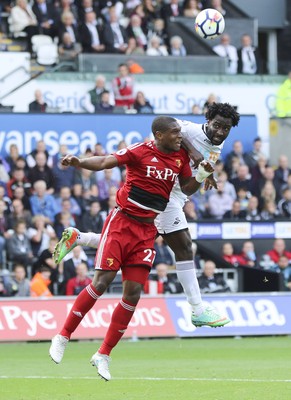 230917 - Swansea City v Watford, Premier League - Wilfried Bony of Swansea City and Christian Kabasele of Watford compete for the ball