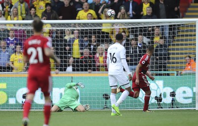 230917 - Swansea City v Watford, Premier League - Richarlison of Watford beats Swansea City goalkeeper Lukasz Fabianski to score Watford's second goal