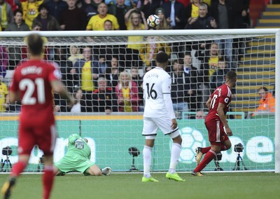 230917 - Swansea City v Watford, Premier League - Richarlison of Watford beats Swansea City goalkeeper Lukasz Fabianski to score Watford's second goal