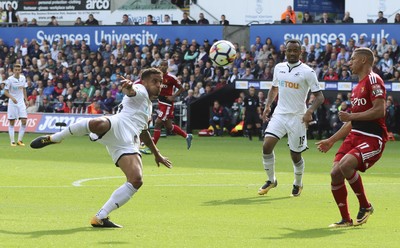 230917 - Swansea City v Watford, Premier League - Kyle Naughton of Swansea City fires a shot at goal