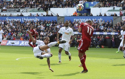 230917 - Swansea City v Watford, Premier League - Kyle Naughton of Swansea City fires a shot at goal