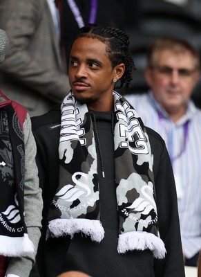 230825 - Swansea City v Watford FC - SkyBet Championship - Snoop Dogg�s son Cordell Broadus watches the game from the stands