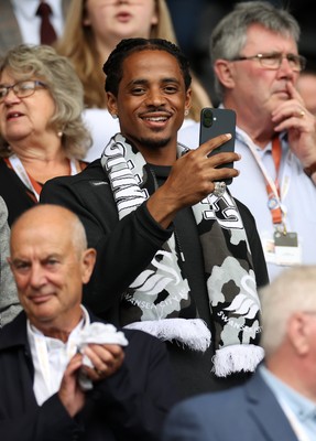 230825 - Swansea City v Watford FC - SkyBet Championship - Snoop Dogg�s son Cordell Broadus watches the game from the stands