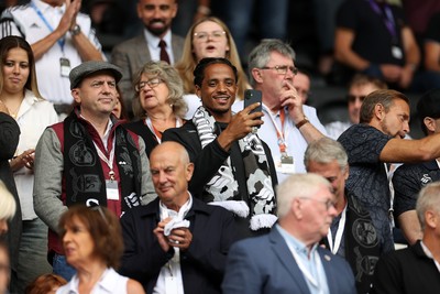 230825 - Swansea City v Watford FC - SkyBet Championship - Snoop Dogg�s son Cordell Broadus watches the game from the stands