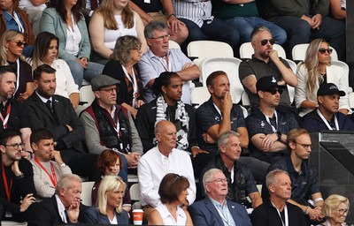 230825 - Swansea City v Watford FC - SkyBet Championship - Snoop Dogg�s son Cordell Broadus watches the game from the stands with Swansea City owner and shareholder Brett Cravatt and Scott Hochstadt
