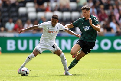 230825 - Swansea City v Watford FC - SkyBet Championship - Ronald of Swansea City is challenged by Luca Kjerrumgaard of Watford 