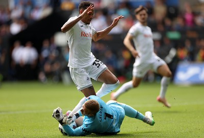 230825 - Swansea City v Watford FC - SkyBet Championship - Ronald of Swansea City collides with keeper Egil Selvik of Watford 