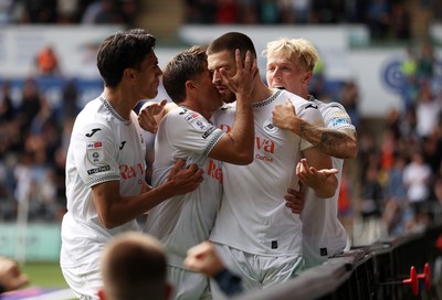 230825 - Swansea City v Watford FC - SkyBet Championship - Zan Vipotnik of Swansea City celebrates scoring a goal with team mates