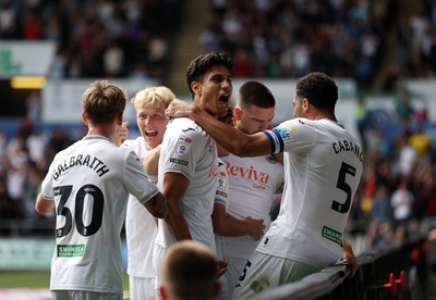 230825 - Swansea City v Watford FC - SkyBet Championship - Zan Vipotnik of Swansea City celebrates scoring a goal with team mates