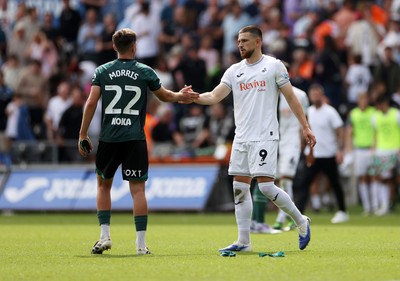 230825 - Swansea City v Watford FC - SkyBet Championship - Zan Vipotnik of Swansea City shakes hands with James Morris of Watford at full time