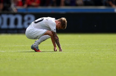 230825 - Swansea City v Watford FC - SkyBet Championship - Dejected Ethan Galbraith of Swansea City at full time