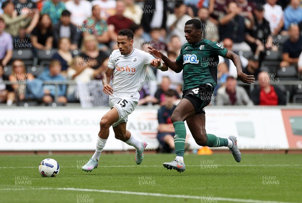 230825 - Swansea City v Watford FC - SkyBet Championship - Ronald of Swansea City is tackled by Kevin Keben of Watford 