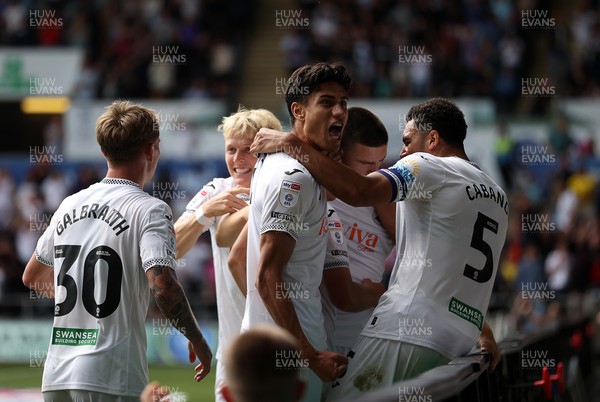 230825 - Swansea City v Watford FC - SkyBet Championship - Zan Vipotnik of Swansea City celebrates scoring a goal with team mates