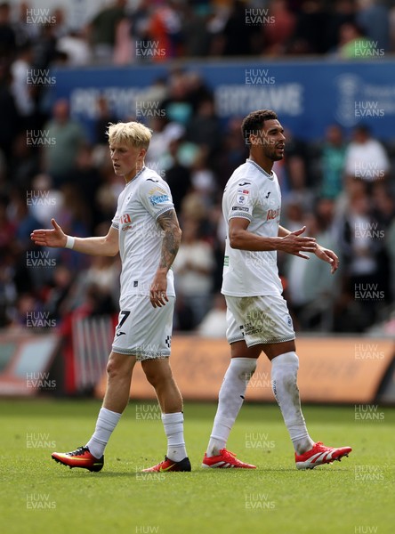 230825 - Swansea City v Watford FC - SkyBet Championship - Melker Widell and Ben Cabango of Swansea City at full time
