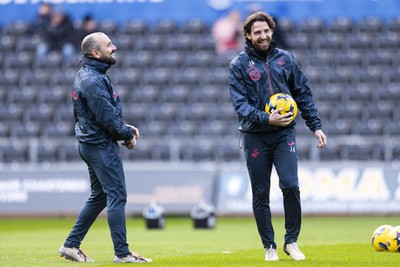 010126 - Swansea City v West Bromwich Albion - Sky Bet Championship - Swansea City coaches Joe Allen & Leon Britton during the warm up