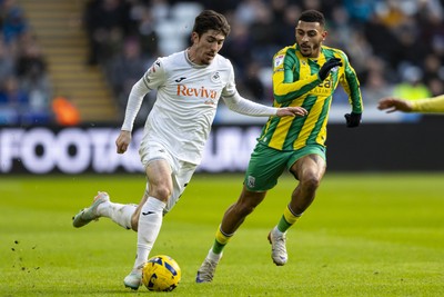 010126 - Swansea City v West Bromwich Albion - Sky Bet Championship - Josh Key of Swansea City in action against Karlan Grant of West Brom