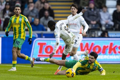 010126 - Swansea City v West Bromwich Albion - Sky Bet Championship - Alex Mowatt of West Brom fouls Malick Yalcouye of Swansea City