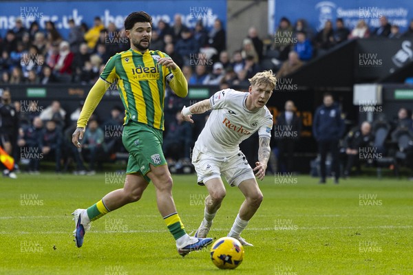 010126 - Swansea City v West Bromwich Albion - Sky Bet Championship - Alex Mowatt of West Brom in action against Melker Widell of Swansea City