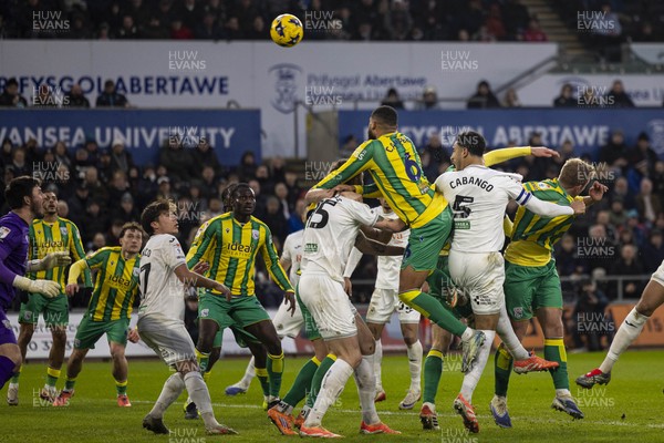 010126 - Swansea City v West Bromwich Albion - Sky Bet Championship - Ben Cabango of Swansea City in action against George Campbell of West Brom