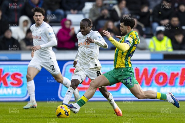 010126 - Swansea City v West Bromwich Albion - Sky Bet Championship - Alex Mowatt of West Brom fouls Malick Yalcouye of Swansea City