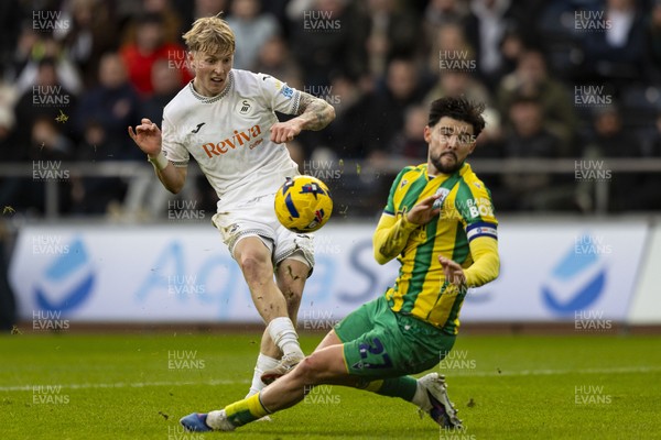 010126 - Swansea City v West Bromwich Albion - Sky Bet Championship - Melker Widell of Swansea City in action against Alex Mowatt of West Brom