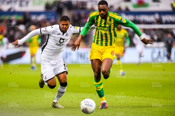 070320 - Swansea City v West Bromwich Albion - SkyBet Championship - ( L-R ) Rhian Brewster of Swansea City and Semi Ajayi of West Bromwich Albion 
