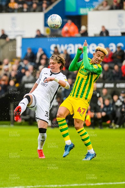 070320 - Swansea City v West Bromwich Albion - SkyBet Championship - Conor Gallagher of Swansea City and Callum Robinson of West Bromwich Albion in action 