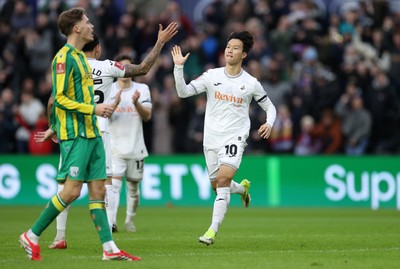 110126 - Swansea City v West Bromwich Albion - FA Cup Third Round - Eom Ji-Sung of Swansea City celebrates scoring a goal