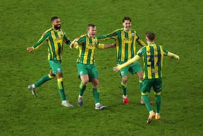110126 - Swansea City v West Bromwich Albion - FA Cup Third Round - Ollie Bostock of West Brom celebrates with team mates after winning the game on penalties