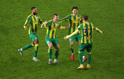 110126 - Swansea City v West Bromwich Albion - FA Cup Third Round - Ollie Bostock of West Brom celebrates with team mates after winning the game on penalties