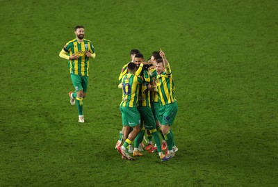 110126 - Swansea City v West Bromwich Albion - FA Cup Third Round - Ollie Bostock of West Brom celebrates with team mates after winning the game on penalties