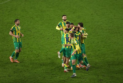 110126 - Swansea City v West Bromwich Albion - FA Cup Third Round - Ollie Bostock of West Brom celebrates with team mates after winning the game on penalties