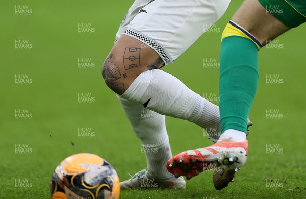 110126 - Swansea City v West Bromwich Albion - FA Cup Third Round - Tattoo of a football pitch on the leg of Goncalo Franco of Swansea City 