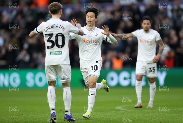 110126 - Swansea City v West Bromwich Albion - FA Cup Third Round - Eom Ji-Sung of Swansea City celebrates scoring a goal