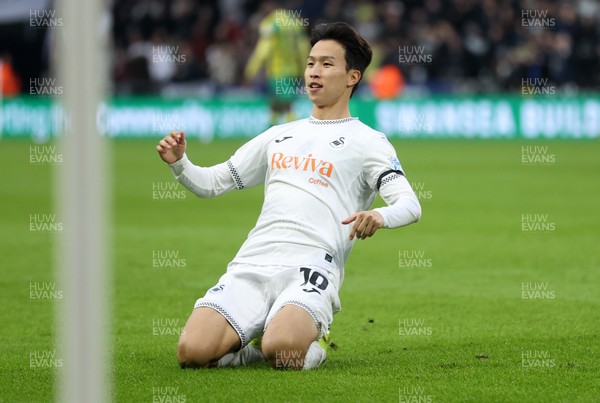 110126 - Swansea City v West Bromwich Albion - FA Cup Third Round - Eom Ji-Sung of Swansea City celebrates scoring a goal