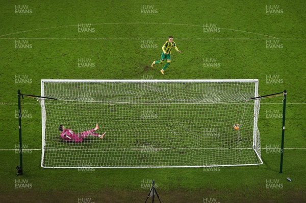110126 - Swansea City v West Bromwich Albion - FA Cup Third Round - Ollie Bostock of West Brom scores the match winning goal in the penalty shoot out