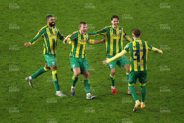 110126 - Swansea City v West Bromwich Albion - FA Cup Third Round - Ollie Bostock of West Brom celebrates with team mates after winning the game on penalties
