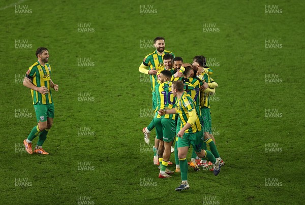 110126 - Swansea City v West Bromwich Albion - FA Cup Third Round - Ollie Bostock of West Brom celebrates with team mates after winning the game on penalties