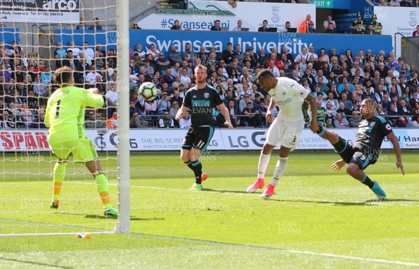 210517 - Swansea City v West Bromwich Albion, Premier League - Jordan Ayew of Swansea City heads to score goal