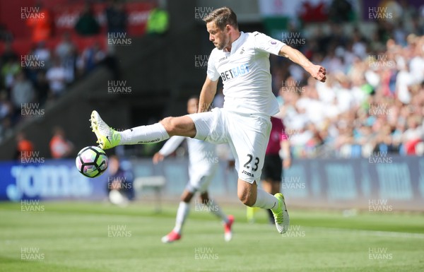 210517 - Swansea City v West Bromwich Albion, Premier League - Gylfi Sigurdsson of Swansea City wins the ball