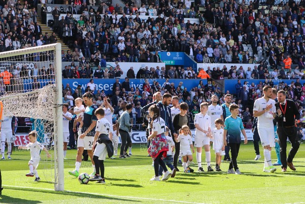 210517 - Swansea City v West Bromwich Albion, Premier League - Swansea City players and their families parade around the Liberty Stadium at the end of the match to thank fans for their support