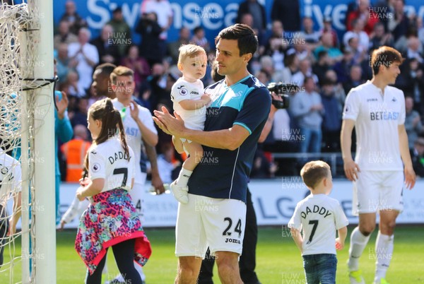 210517 - Swansea City v West Bromwich Albion, Premier League - Jack Cork of Swansea City joins the rest of squad and their families as they parade around the Liberty Stadium at the end of the match to thank fans for their support