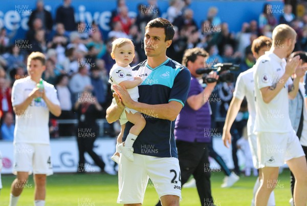 210517 - Swansea City v West Bromwich Albion, Premier League - Jack Cork of Swansea City joins the rest of squad and their families as they parade around the Liberty Stadium at the end of the match to thank fans for their support