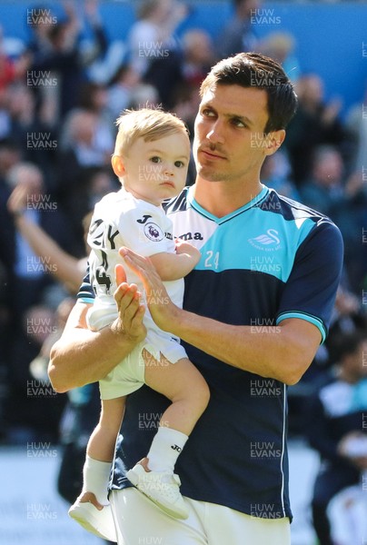 210517 - Swansea City v West Bromwich Albion, Premier League - Jack Cork of Swansea City joins the rest of squad and their families as they parade around the Liberty Stadium at the end of the match to thank fans for their support