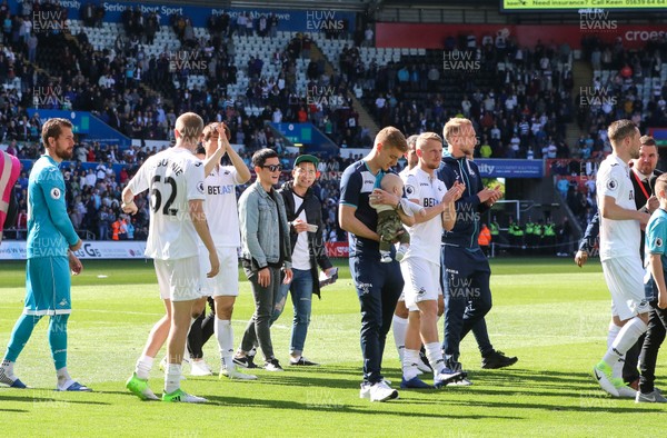 210517 - Swansea City v West Bromwich Albion, Premier League - Swansea City players and their families parade around the Liberty Stadium at the end of the match to thank fans for their support