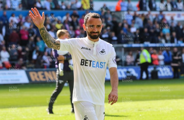 210517 - Swansea City v West Bromwich Albion, Premier League - Leon Britton of Swansea City  joins the rest of squad and their families as they parade around the Liberty Stadium at the end of the match to thank fans for their support