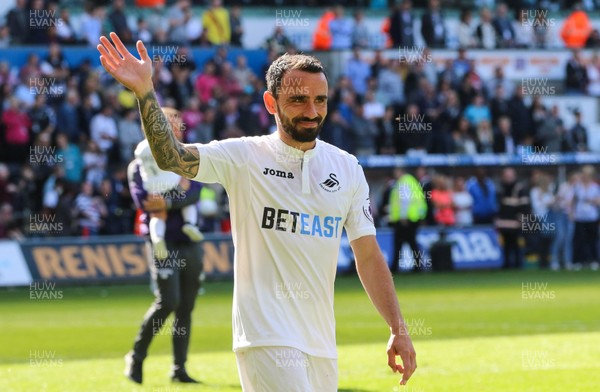 210517 - Swansea City v West Bromwich Albion, Premier League - Leon Britton of Swansea City  joins the rest of squad and their families as they parade around the Liberty Stadium at the end of the match to thank fans for their support