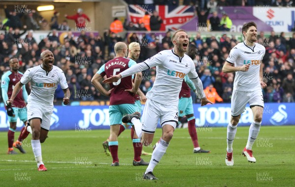 030318 - Swansea City v West Ham United, Premier League - Mike van der Hoorn of Swansea City celebrates after scoring the second goal