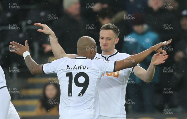 030318 - Swansea City v West Ham United, Premier League - Andy King of Swansea City celebrates with Andre Ayew of Swansea City after scoring goal